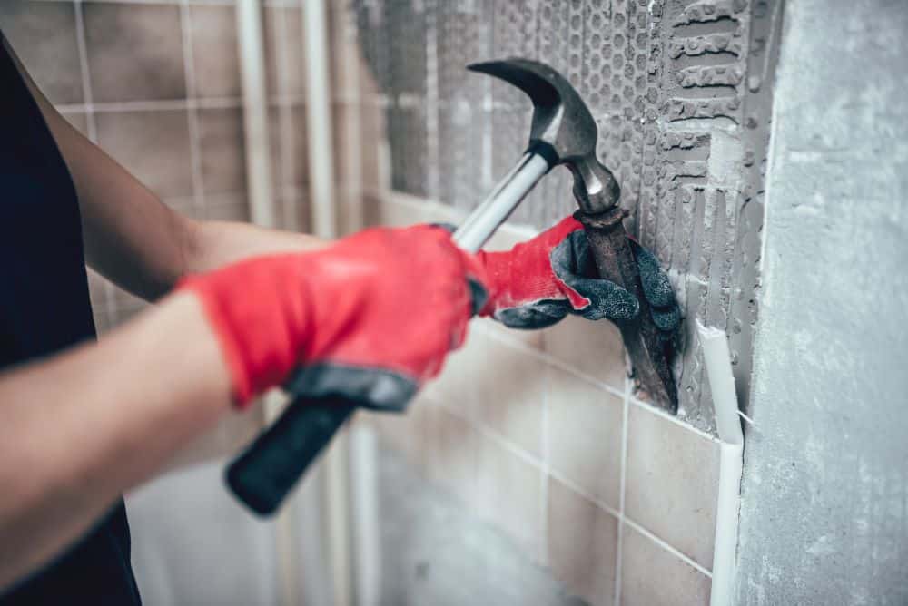 Demolition of kitchen tiles prior to renovation